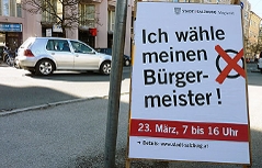 Plakat der Stadt Salzburg für die Wahlbeteiligung bei der Stichwahl am 23. März